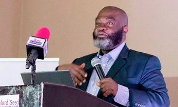 David Ofosu-Dorte, the Executive Chairman of AB &amp; David Law, addressing the conference